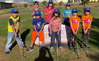 Enhancing Forward Action Inc. image of a group of children golfers posing
