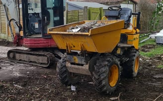 Dumper and roller used for groundwork in West Bromwich