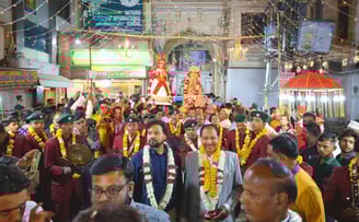 Owner Manohar Lal leading the Manohar Brass Band, with people welcoming them enthusiastically in grand Gangaur Fest.