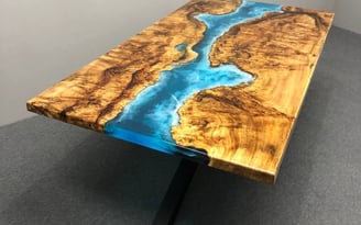 a table with a blue river flowing through it