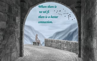 a person sitting on a bench in contenplation