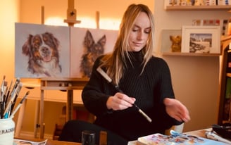 Working on a commission in my art studio