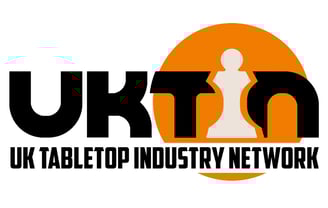 A logo for UK TIN. An orange circle frames "TIN", with the I replaced by a pawn.