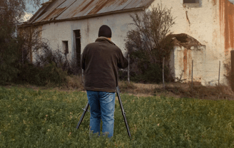 Martin Osner capturing an old abandoned building on location during the creation of his fine art Abandoned Places Photography