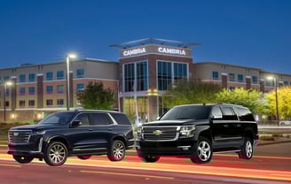 Executive SUV waiting at hotel entrance