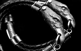 a snake skin leather bracelets with CROW head