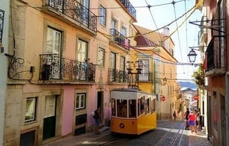Lisbon - an old world city with cobblestone streets that blends ancient & modern