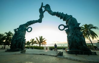Playa del Carmen, Mexico - Huge arch statue at the entrance to the beach