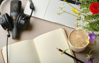 Microphone laptop headphones and jorunal  header image for offer page 