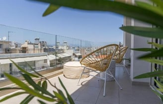 spacious glass outside balcony, 2025, wooden chairs, minimalist style, marina zeas apartments