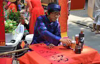 Street artist in Ho Chi Minh City, Vietnam