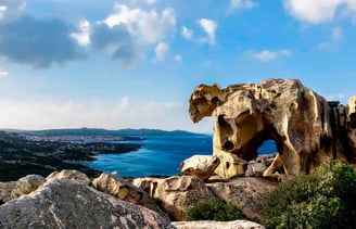 The Bear Rock (Roccia dell’Orso) perched above the Sardinian coastline, with a panoramic view of the