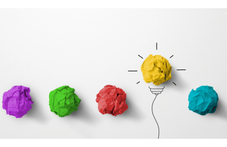 Crumpled paper forming a lightbulb symbolizing data-driven insights and marketing innovation