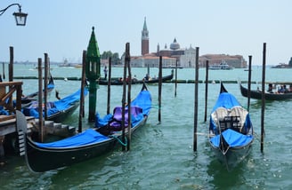 Gondolas in Venice, Italy with Piazza San Marco in the background