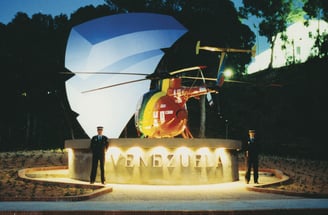 a helicopter that is sitting on a concrete wall