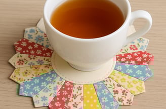 Teacup on a small handmade Dresden doily.