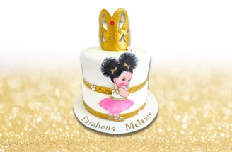 a cake with a princess cake topper