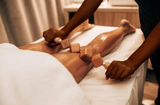 African American Women Doing Wood Therapy on Hamstrings