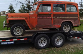 Car on a flatbed Trailer