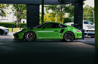 Green Porsche GT3 RS car photography at 704 Exotics.