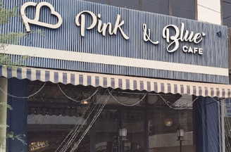 An image showing facade of Pink and Blue cafe