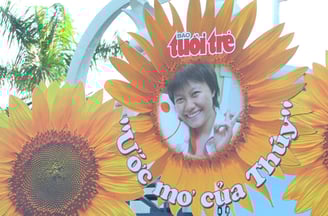 a sign with a picture of a young girl in a sunflower