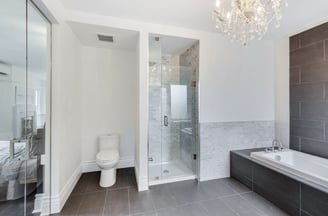 a bathroom with a chandelier