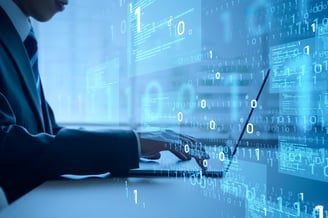 Developer creating tailored custom-built software on laptop
