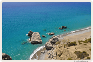 Large rocks and the serene seashore of Listis Beach, Crete, Greece