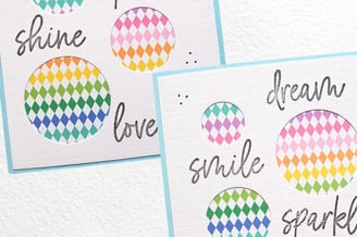 Colorful patterned circles on textured cards with words like "shine," "dream," "smile," and "sparkle
