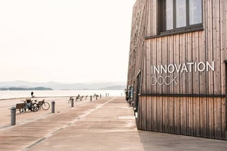 a wooden building with a sign that says innovation book