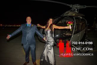 happy wedding couple by helicopter