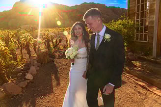 wedding couple walking out of wedding chapel