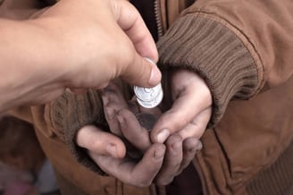 a person holding a pill pill in their hands