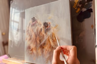 Adding some final details to the painting after the retouch varnish has dried