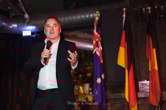 Graeme Mason speaking to guests at a Berlinale event.