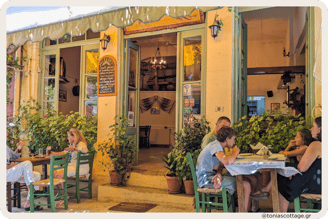 Colorful entrance of an Archanes restaurant, offering traditional Cretan cuisine
