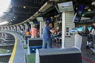 a man is taking a picture of a baseball game