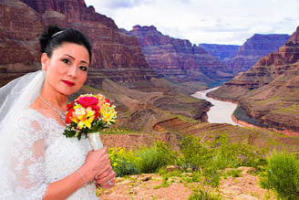 bride with flowers at the grand canyon