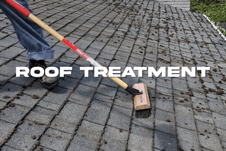 a person with a broom and a broom on a brick wall