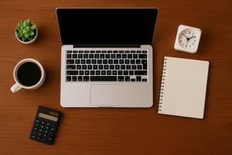 Neat desk with laptop, clock and coffee—clarity, partnership, continuous improvement values