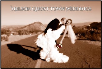 a bride and groom kissing on the road