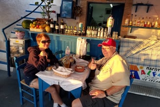 Lady and The Pirate convince the owner to open the restaurant just for them in Santorini, Greece