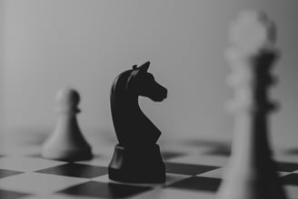 a chess game with chess pieces on a chess board