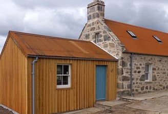 Wooden Extension on stone cottage