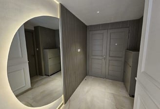 a mirror mirror in a bathroom with a mirror in the middle