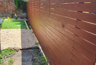 Installed and stained this beautiful vertical fence.