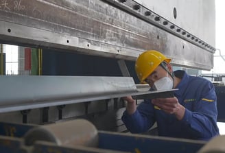 We verify bent metal component angles meet our strict accuracy specs, guaranteeing your truck mounted crane's quality.