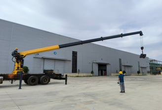 Our team's critical static/dynamic load test on a 10T telescopic truck crane ensures it meets stringent factory standards.