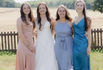 Bride photographed with her friends at a UK summer wedding